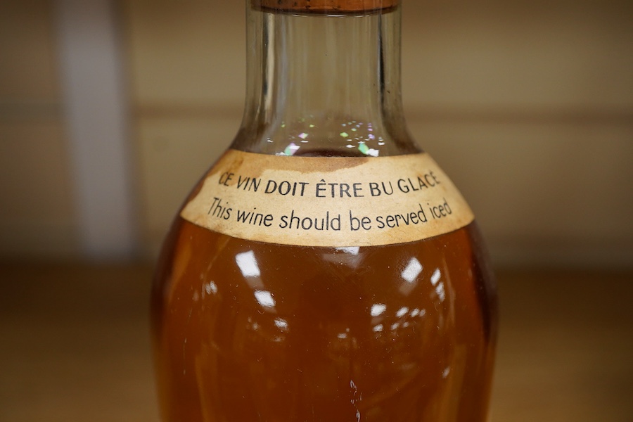 A bottle of Chateau Haut Brion, 1953, imported by FS Matta, London